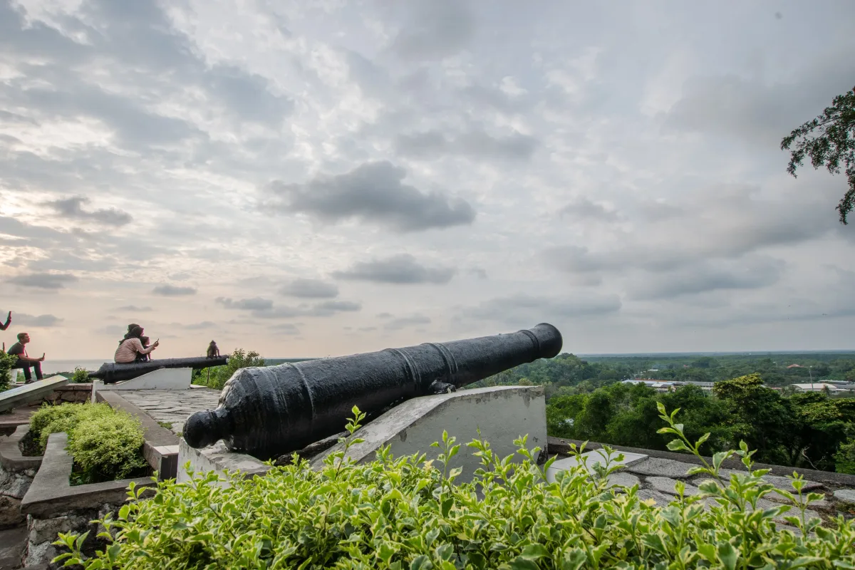 Cannons on the hilltop at Bukit Melawati, Kuala Selangor, looking out over the coastal plain
