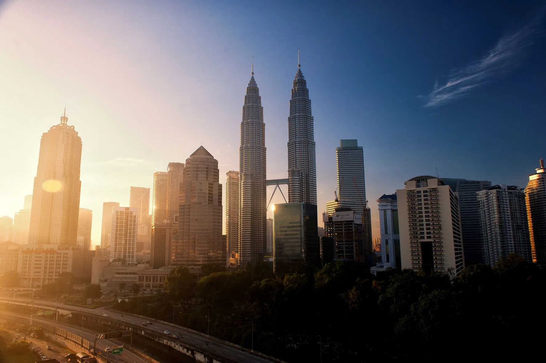 The Kuala Lumpur skyline with the Petronas Twin Towers in low sun