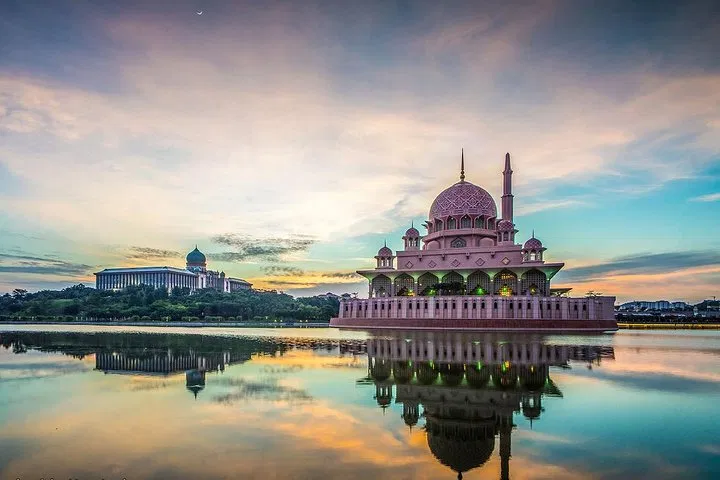 The Putra Mosque and Perdana Putra across Putrajaya Lake at sunset